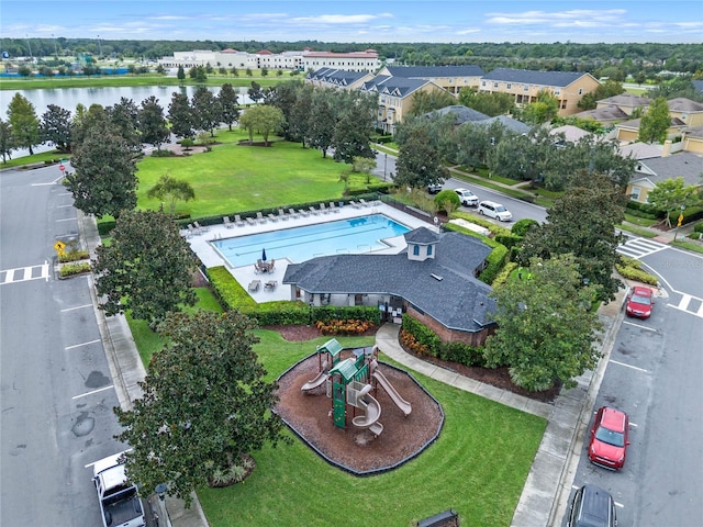 birds eye view of property featuring a water view