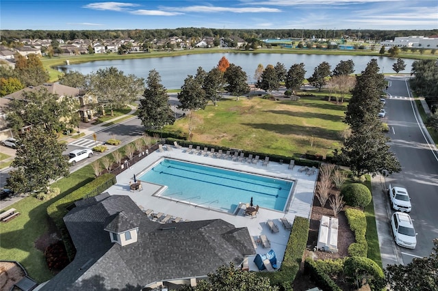 birds eye view of property featuring a water view