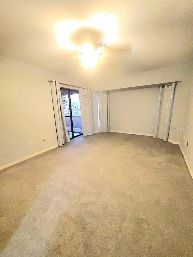 empty room featuring carpet floors