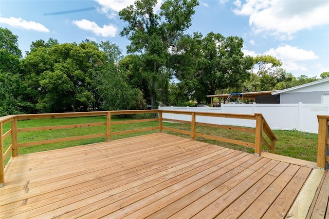 wooden deck with a yard