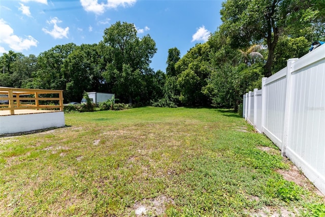 view of yard with fence