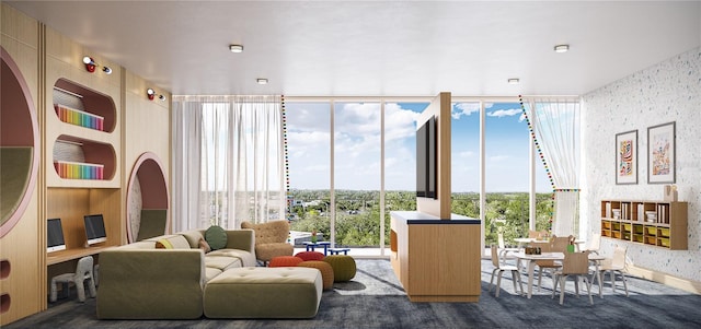 living area featuring floor to ceiling windows