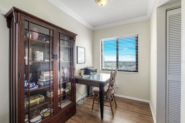 office with dark hardwood / wood-style floors and crown molding