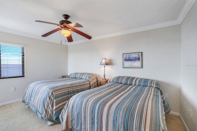 bedroom with ceiling fan and crown molding