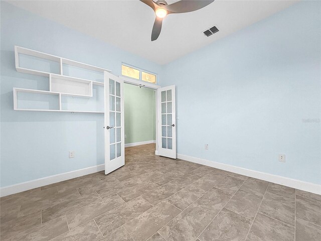 unfurnished bedroom featuring ceiling fan, french doors, a closet, and tile patterned flooring