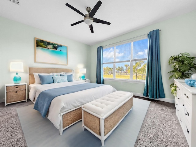 carpeted bedroom featuring ceiling fan