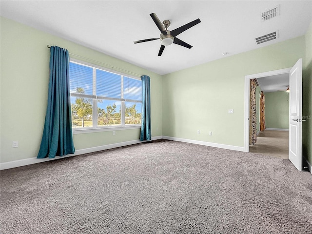 unfurnished bedroom featuring ceiling fan and carpet flooring