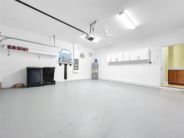 garage with water heater, a garage door opener, and electric panel