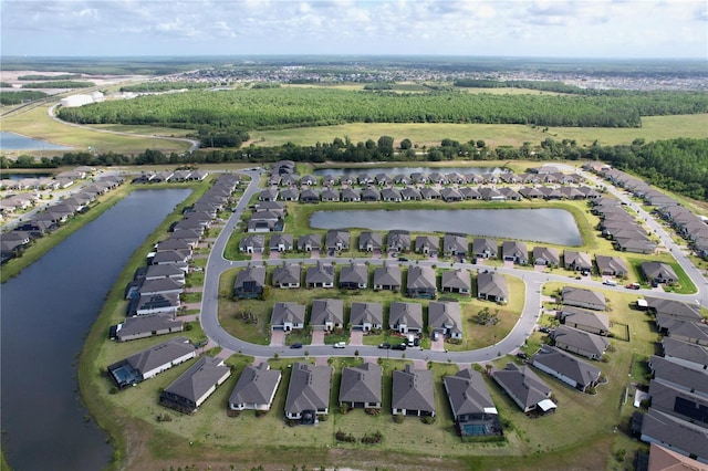 aerial view featuring a water view and a residential view