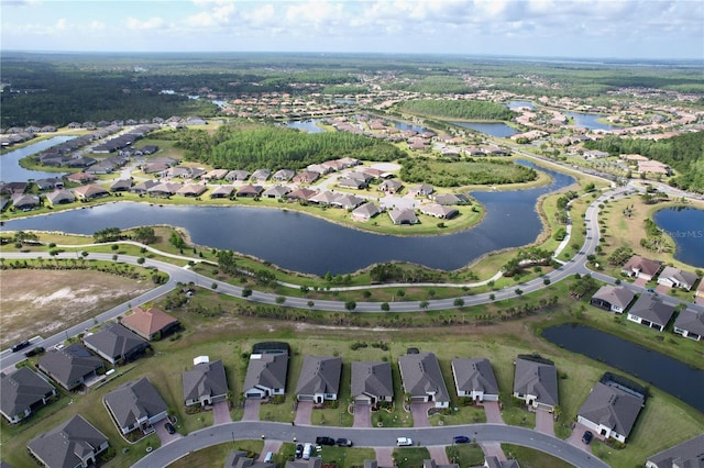 aerial view with a residential view and a water view