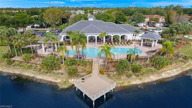 birds eye view of property featuring a water view