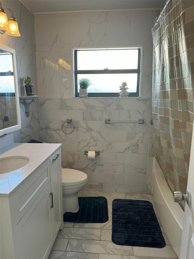 full bathroom with shower / bathtub combination with curtain, plenty of natural light, vanity, and tile walls