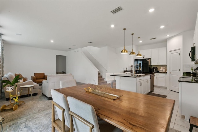 tiled dining space with sink