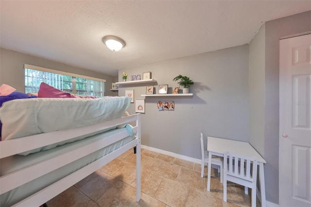 bedroom with tile patterned flooring