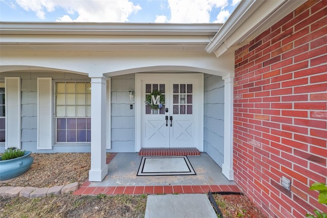 entrance to property with a porch