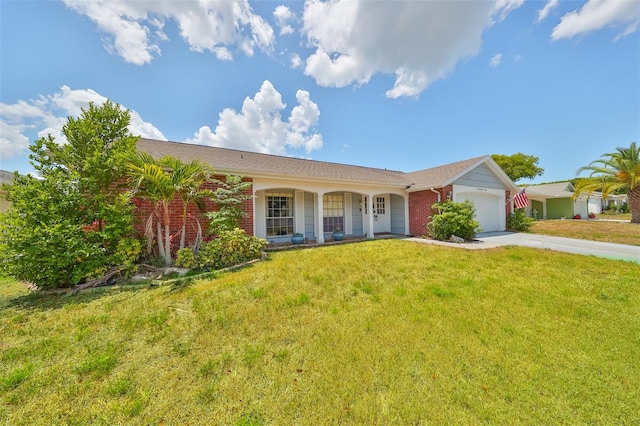 ranch-style house featuring a garage and a front lawn