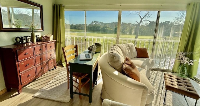 sunroom / solarium featuring a wealth of natural light