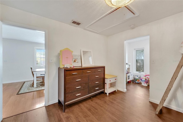 interior space with hardwood / wood-style flooring