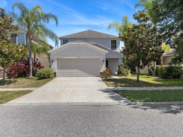 view of front of home featuring a garage