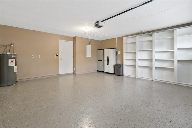 garage with a garage door opener and electric water heater