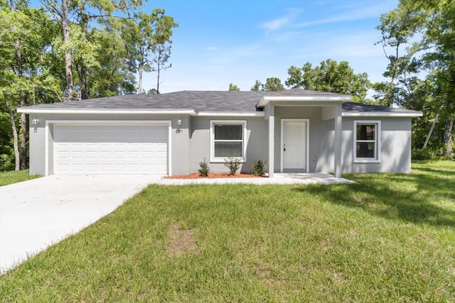 ranch-style house featuring a garage and a front lawn