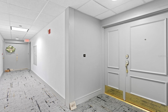 entryway featuring a paneled ceiling