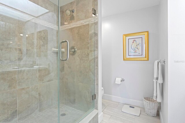 bathroom with an enclosed shower