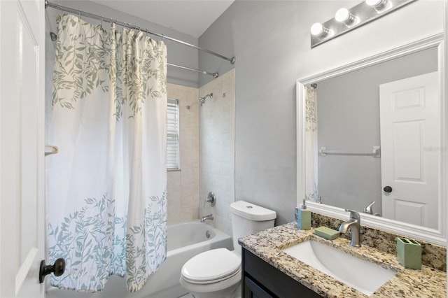 full bathroom featuring shower / tub combo, toilet, and vanity