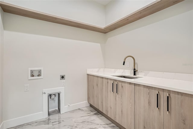 clothes washing area featuring sink, washer hookup, light tile flooring, and hookup for an electric dryer