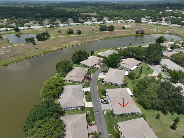 drone / aerial view with a water view