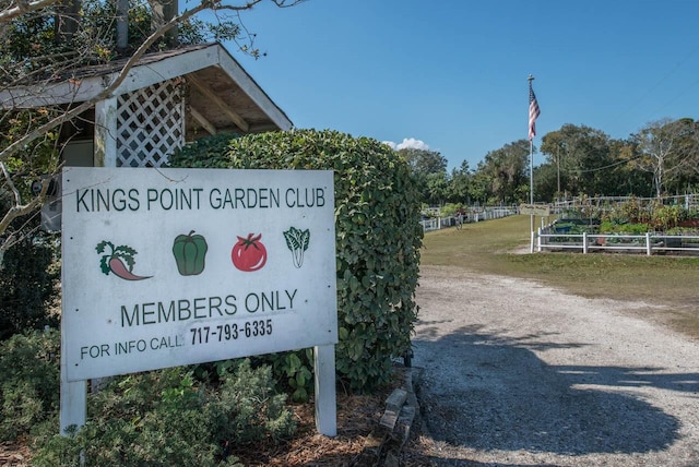 view of community sign