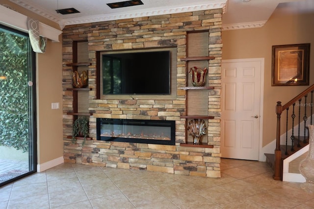 tiled living room with a fireplace and ornamental molding