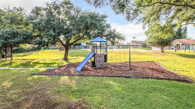 view of playground with a yard