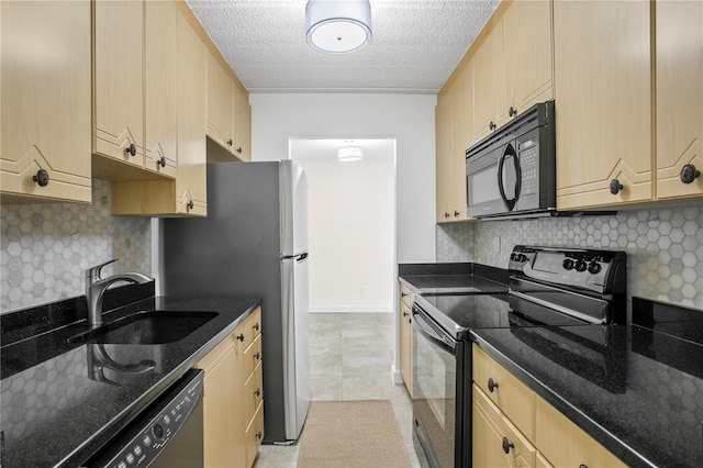 kitchen featuring light tile floors, light brown cabinets, black appliances, and sink