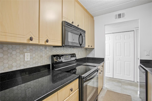 kitchen featuring light brown cabinetry, black appliances, backsplash, and light tile flooring