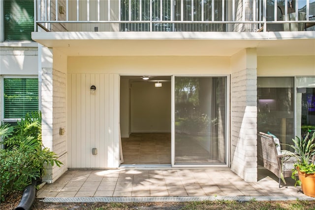 entrance to property featuring a balcony