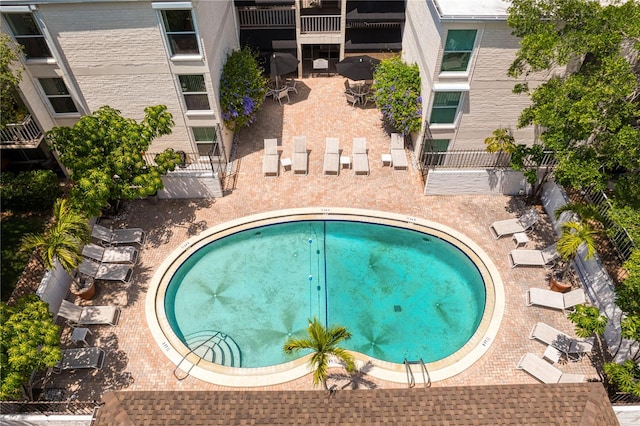 view of swimming pool with a patio