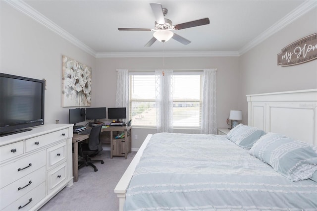 carpeted bedroom with ceiling fan and ornamental molding