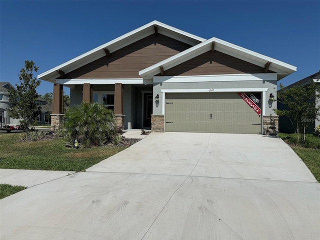 craftsman-style house with a garage