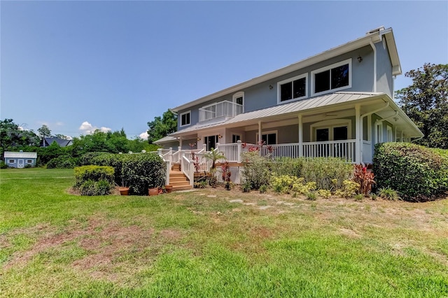 farmhouse-style home with a front lawn