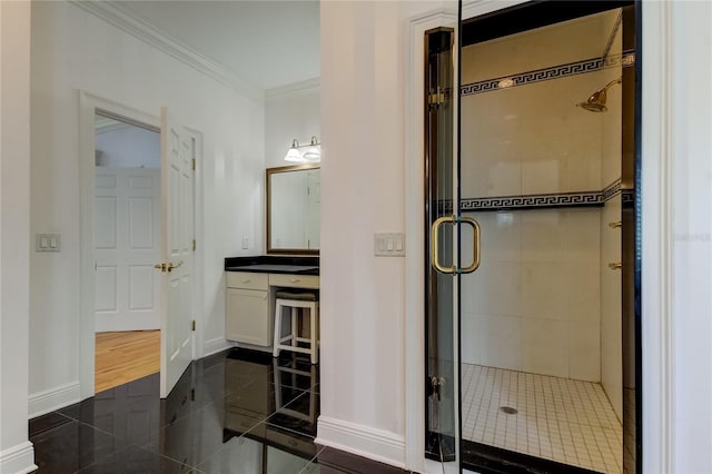 bathroom with vanity, ornamental molding, walk in shower, and tile patterned flooring