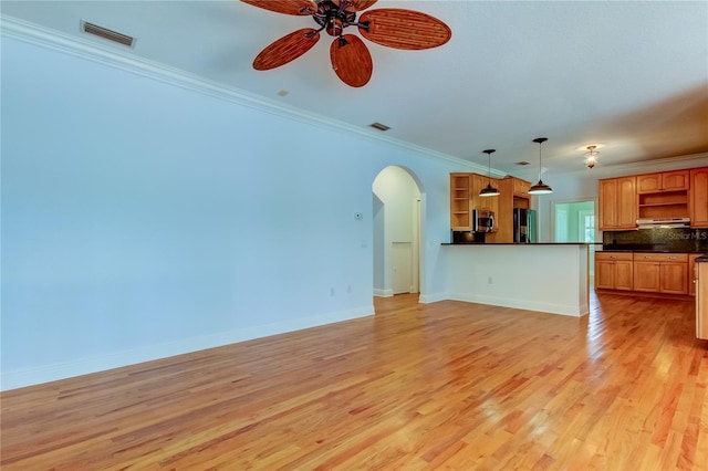 unfurnished living room with crown molding, light hardwood / wood-style flooring, and ceiling fan