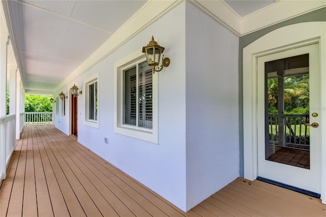 wooden deck featuring covered porch