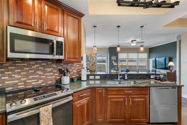 kitchen featuring crown molding, sink, range with electric cooktop, tasteful backsplash, and dishwasher