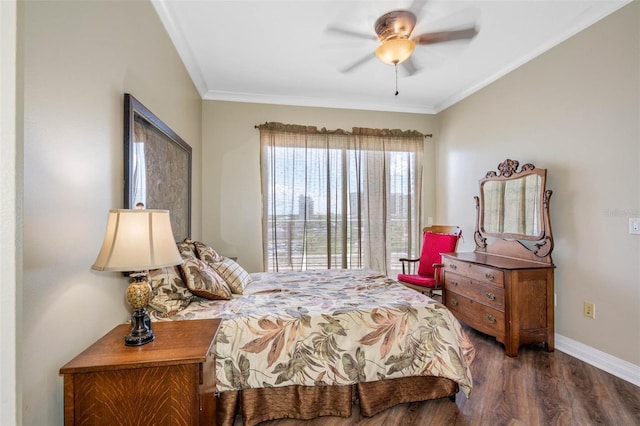 bedroom with crown molding, dark wood-type flooring, and ceiling fan