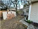 view of yard with a garage and an outdoor structure