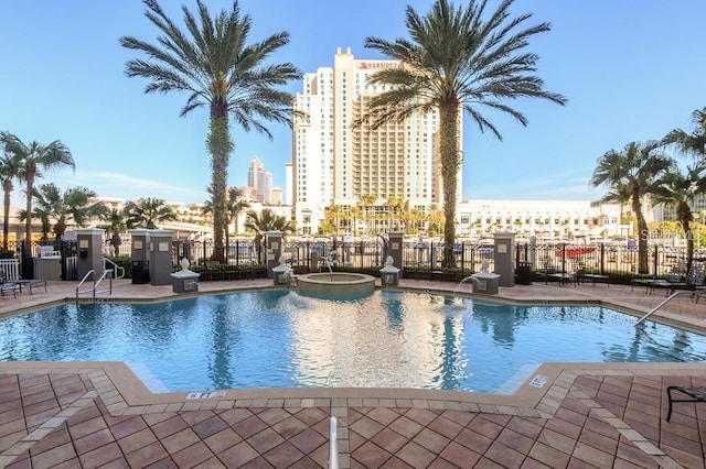 view of pool featuring a patio area