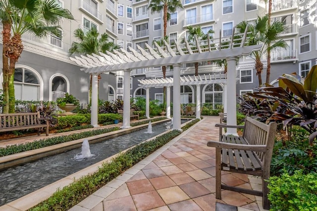 view of property's community featuring a pergola