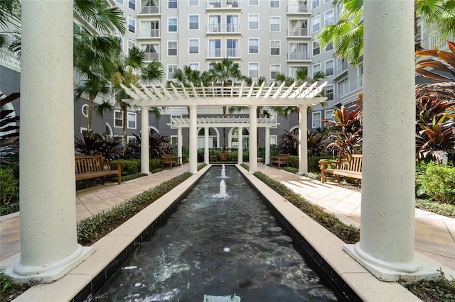 view of property's community featuring a pergola