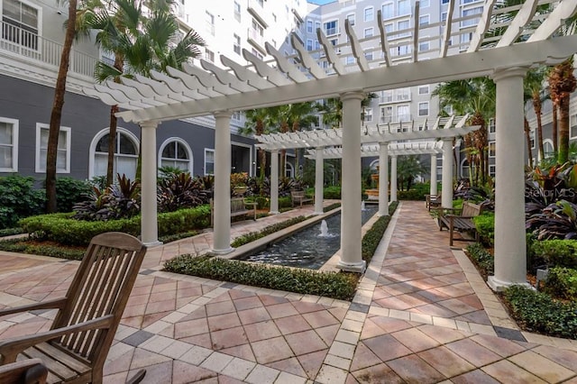 view of terrace with a pergola